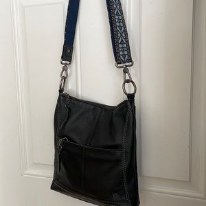 An unused the Sack Lucia crossbody black leather bag.